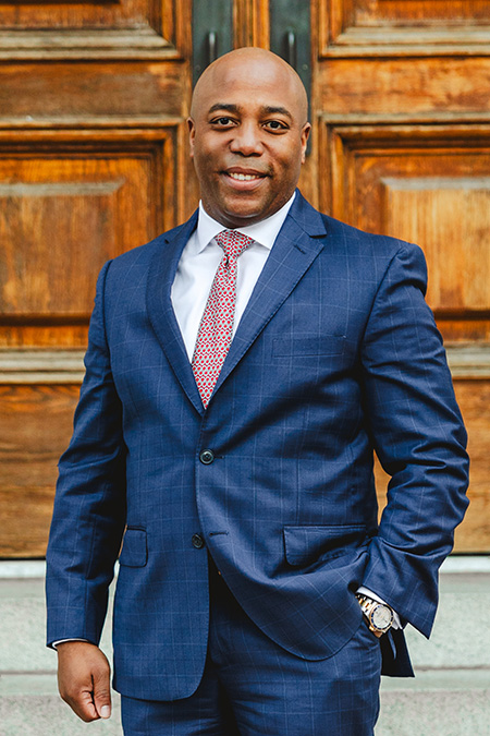 Image of Charles Duncan smiling at the camera.
