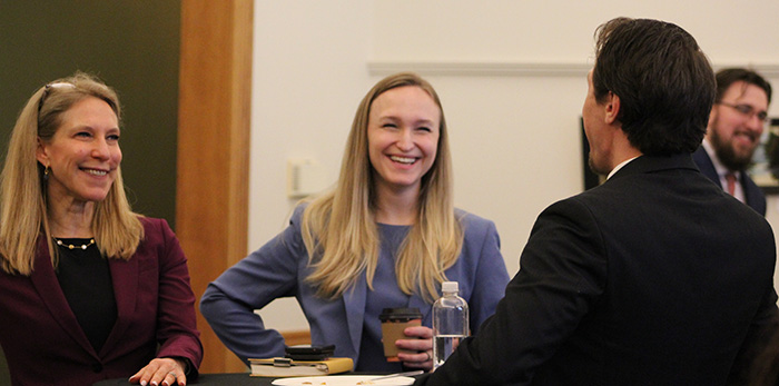 Image of Professor Michal Buchhandler-Raphael with Lauren Marvel speaking with students at the 2025 Spring Law Review Symposium.