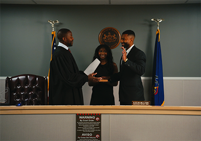 W. Keith Williams II and III along with Sierra at his swearing in. 