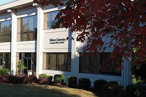 Exterior view of the Widener University Commonwealth Law School library building during the fall season.