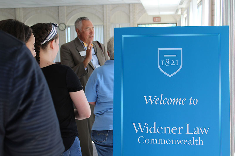 photo of Dean Benfield welcoming students at a picnic