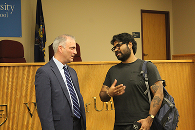 Judge Bianco talking with a student following his lecture. 