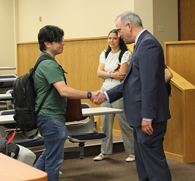 Judge Bianco shaking a students hand after his lecture. 