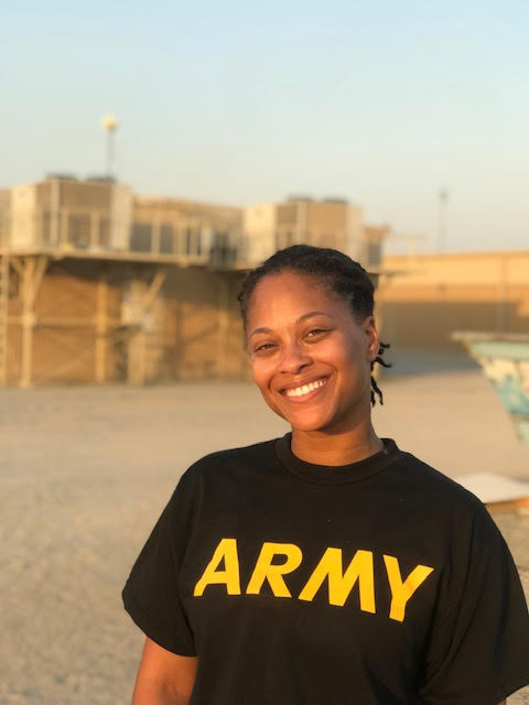 Photo of Brittany in an Army shirt