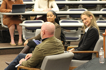 Michael Consedine speaking with students in the Wolfberg Courtroom.