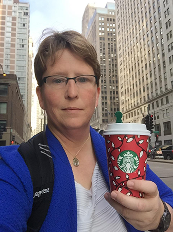 An image of Kelly giving a cybersecurity lecture at NARUC in Boston (July 2025)