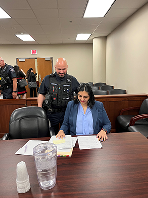 2L student Maha Farooq preparing paperwork for court.