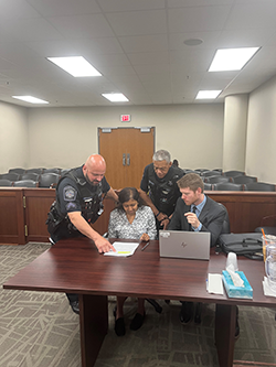 Students preparing paperwork for court. 