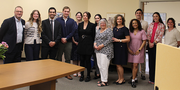 Group photo of the current students, Dean cummings, Mary Catherine Scott and Rebecca Waldemar