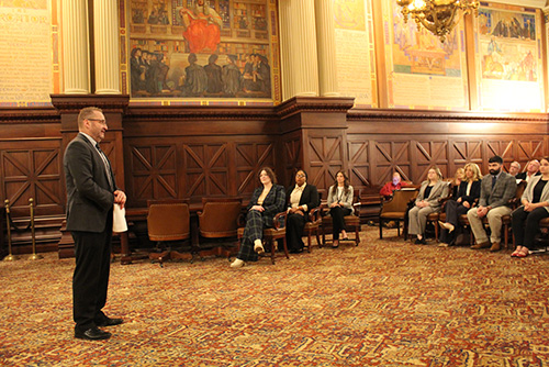 Dean cummings stand in the PA Supreme Court room addressing the crowd. 