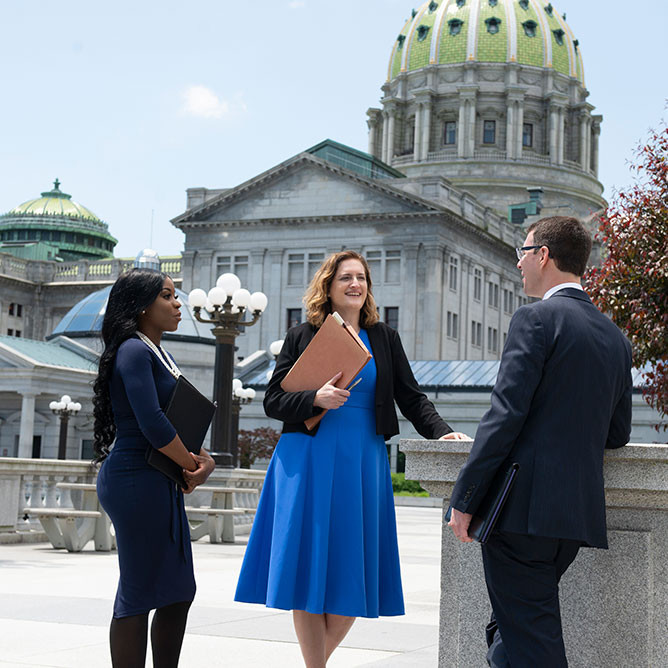 Professor family with students at the Capitol