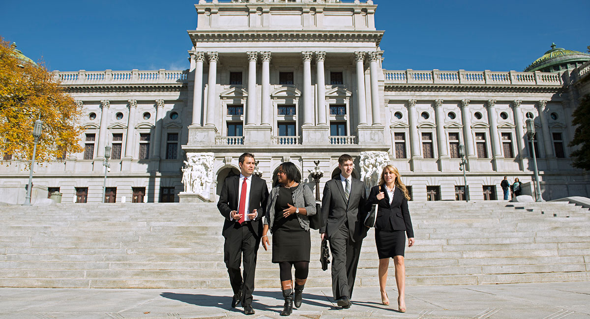 Students walking down capitol stairs