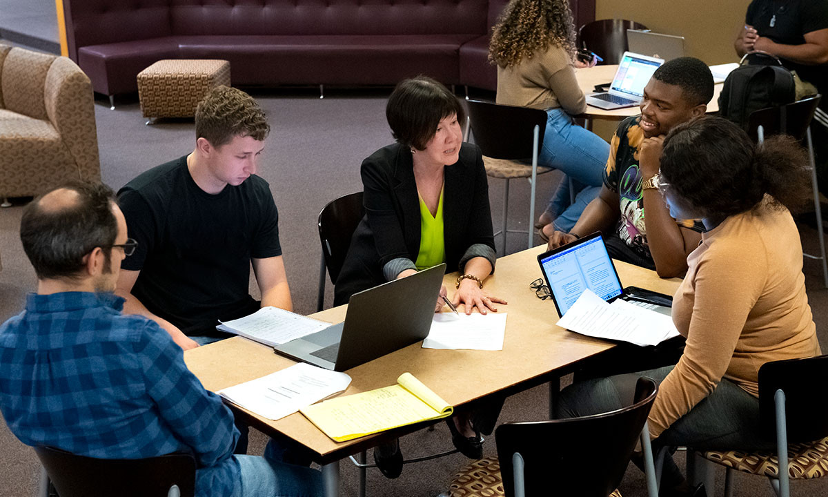 Students sitting around a table