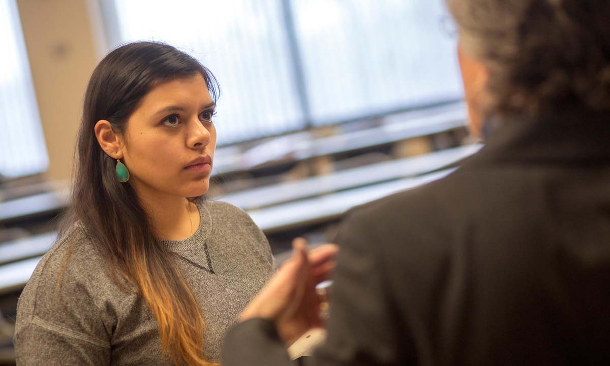 Female student listening to counselor