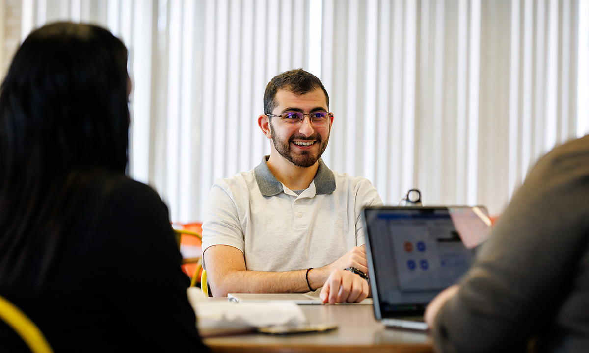 Male student smiling