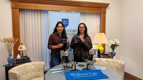 Michelle and Johana standing in the podcast studio!