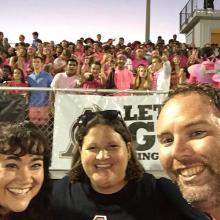 Photo of student at football game